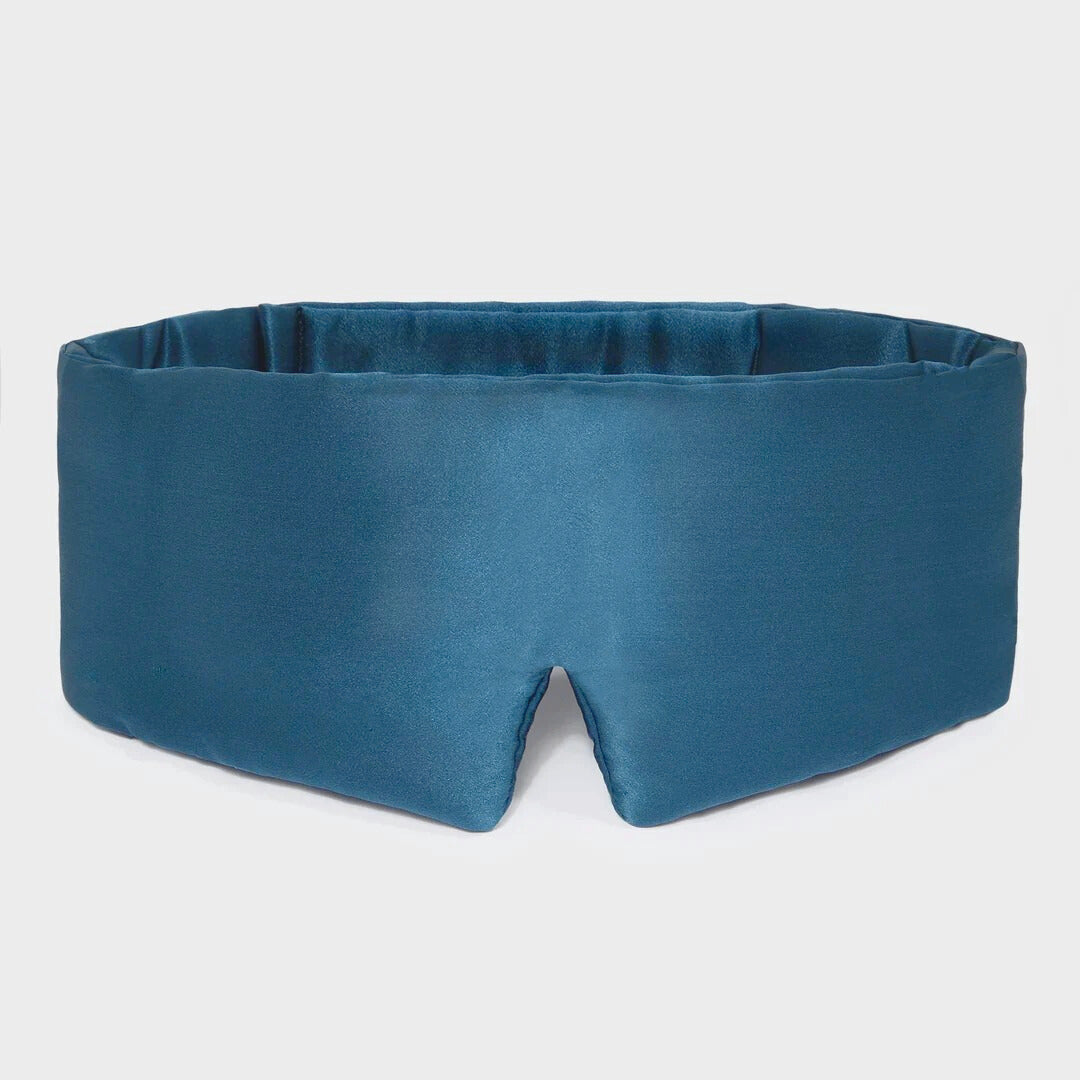 Blue sleep mask on a light gray background Nº 14 Bleu Céleste