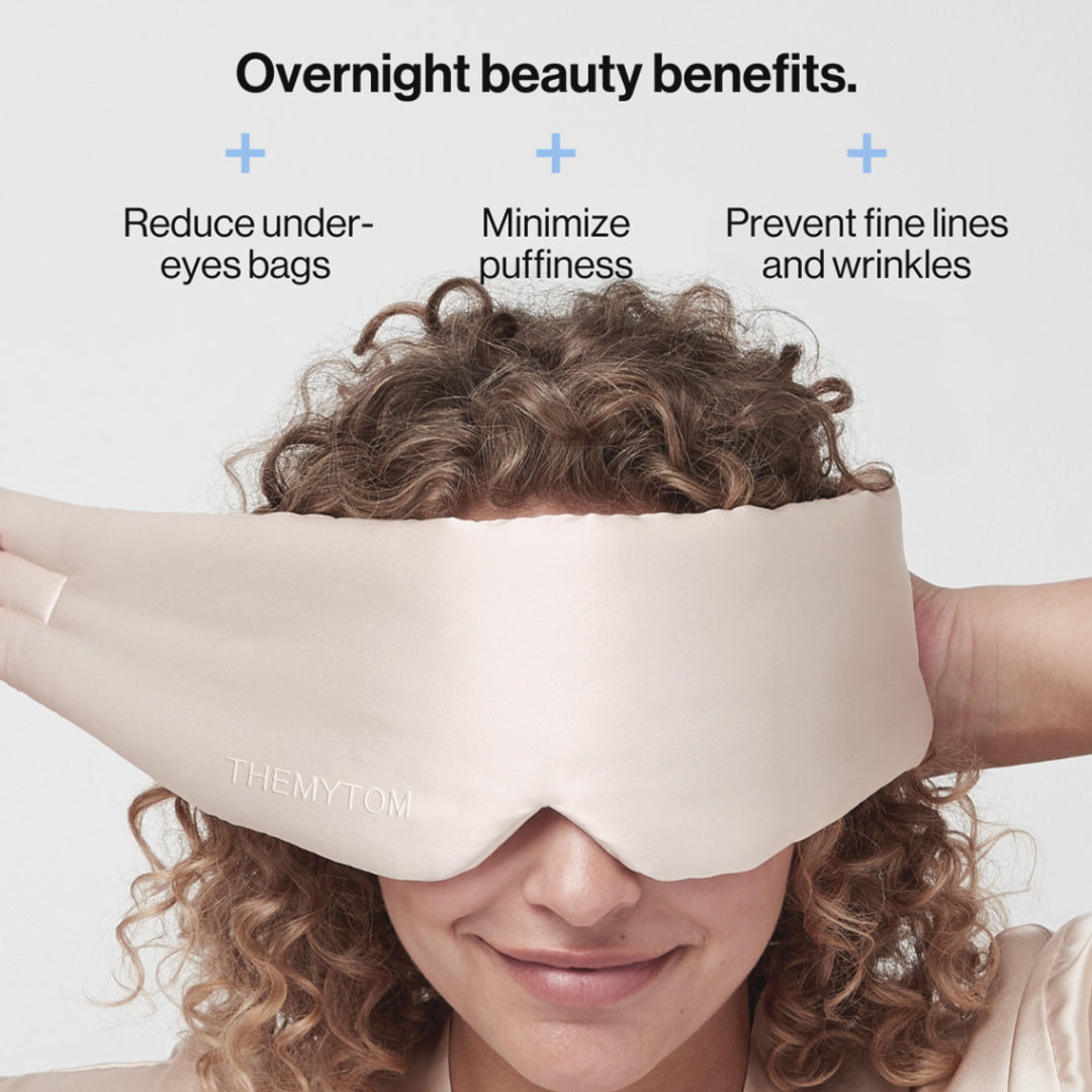 Person wearing a white sleep mask with text about overnight beauty benefits on a light gray background Nº 08 Brume d’Argent