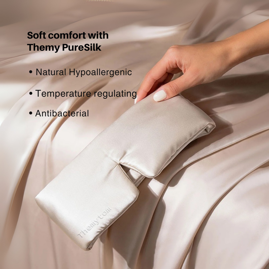 Themy PureSilk pillowcase being held over a bed with product features listed. Nº 08 Brume d’Argent