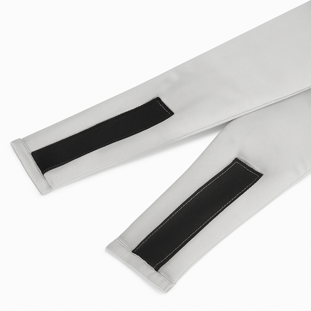 Two white straps with black Velcro fasteners on a white background Nº 08 Brume d’Argent